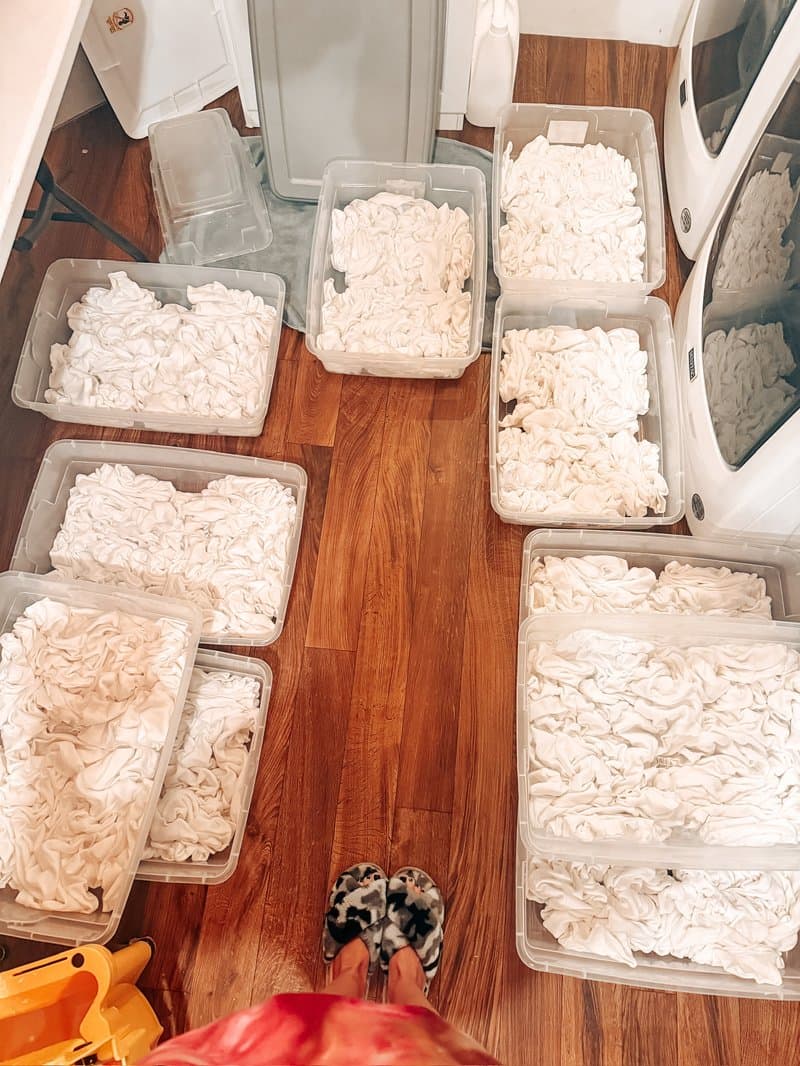 White blanks soaking in soda ash before ice dyeing
